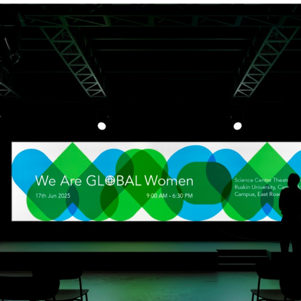 Event poster for 'We Are GLOBAL Women' with geometric design on a screen.